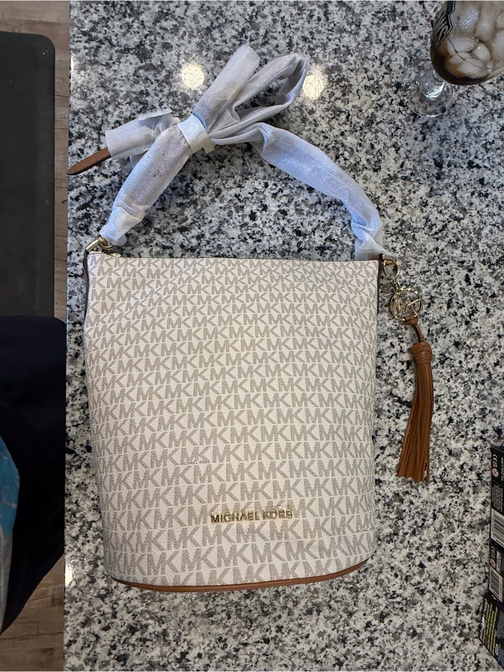 Michael Kors Large White MK Monogram Crossbody with Tan Tassel